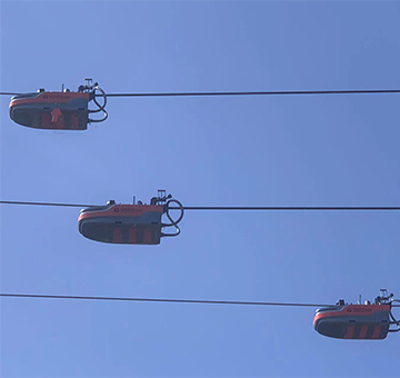 3臺(tái)機(jī)器人助力上海長(zhǎng)興35kV架空裸導(dǎo)線絕緣化改造